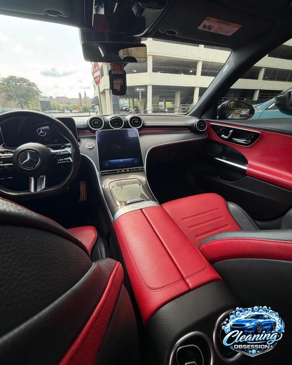 Mercedes front passenger cabin, console and red seats
